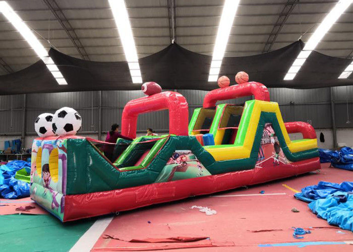 Colorful Soccer Massive Inflatable Obstacle Course For Kids 0.55mm PVC Material